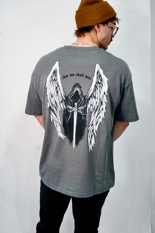 Angel of death tee, grey in color, size XL. Reading "this too shall pass" on the back. Distressed Total Grit Logo on the front.