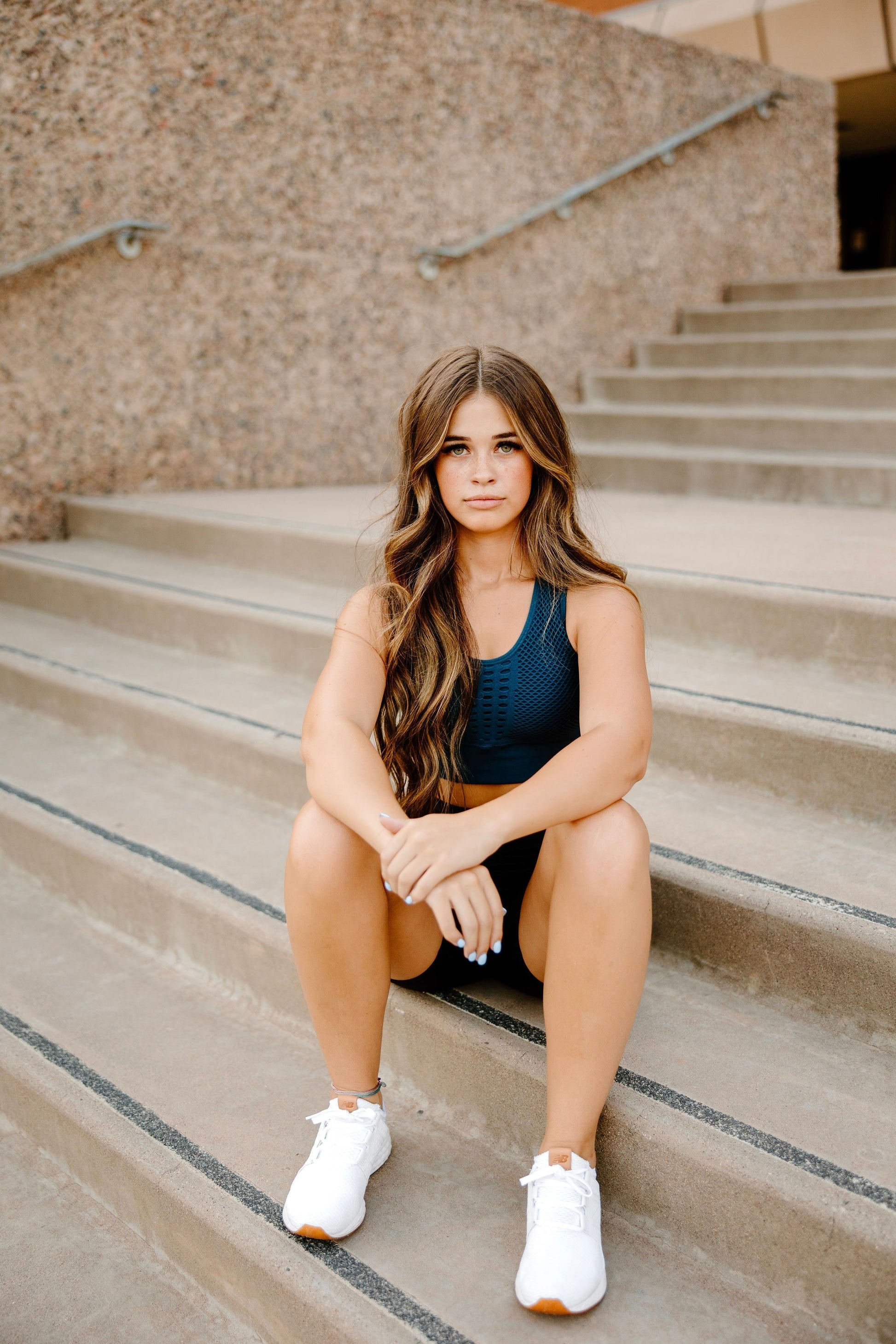 Navy Blue Total Grit sports bra, breathable design, and perfect to wear in a casual setting, or to crush a workout.