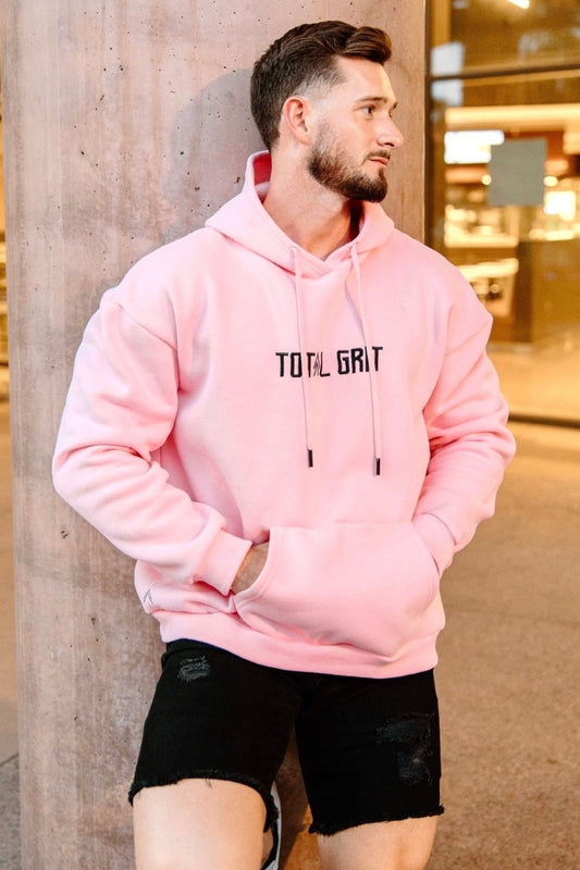 Front shot of the light pink Pastel Hoodie, showing off drawstrings and front pocket. Very comfy fit.